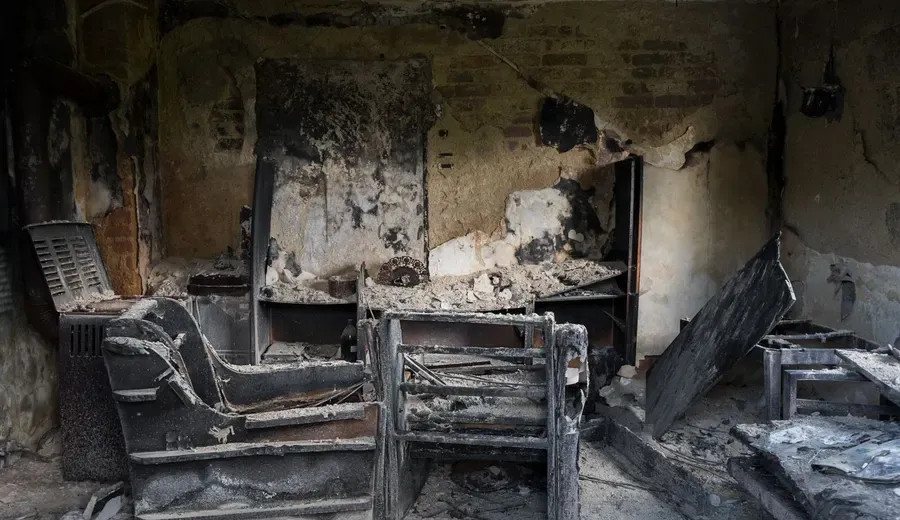 Fire-damaged interior awaiting cleanup before rebuilding