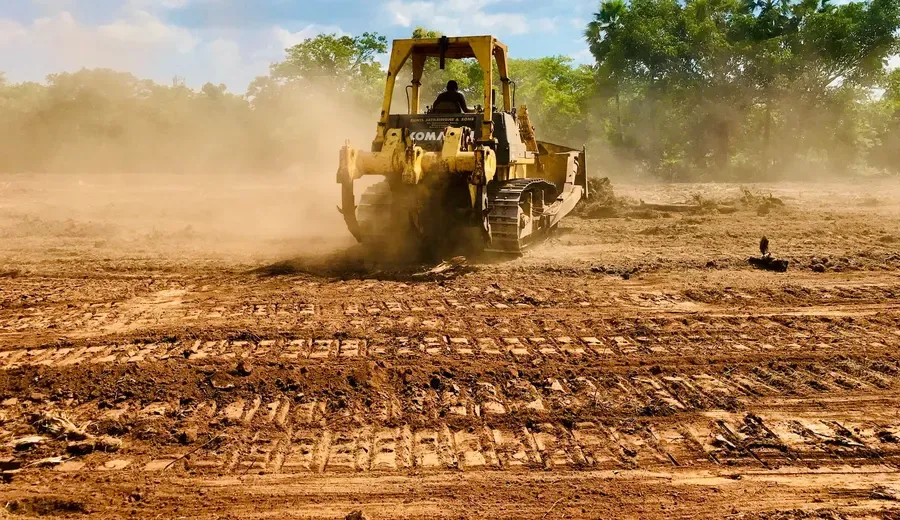 Ground being prepared after a structure came down, near Somerset, Texas